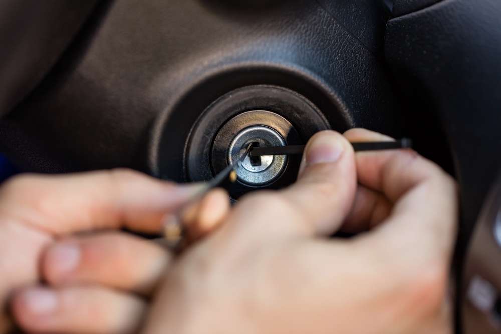 Locksmith making a car key